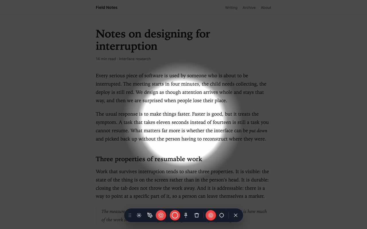 A web article dimmed except for a bright spotlight around the pointer, with the presenter dock along the bottom.